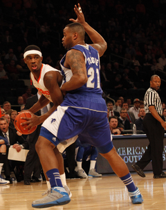 C.J. Fair looks for an opening at the baseline against SHU's Gene Teague. Fair scored 16 points and grabbed eight rebounds in the 75-63 SU victory.