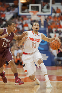 Ennis drives on Rams guard Chris Whitehead.  