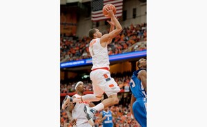 Michael Carter Williams drives through traffic to attempt a floater against Central Connecticut State. The sophomore point guard finished with 18 points in the game.