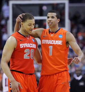 Brandon Triche floats above the lane in Syracuse's 81-34 win over No. 13-seed Montana Thursday night in HP Pavilion in San Jose. Triche dropped 20 points on the evening as the Orange advanced to face No. 12-seed California Saturday.