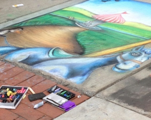 Montgomery Street transformed into the Chalk Zone on Saturday during the 24th annual Syracuse New Times Painting Festival. Artists of all ages and skills competed for cash and  prizes from local businesses.