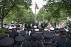 Syracuse first responders look on during a ceremony held downtown Sunday in remembrance of the Sept. 11 attacks.