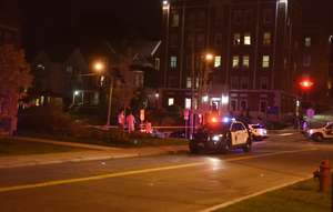 Police cars surround the crime scene near Walnut Park.