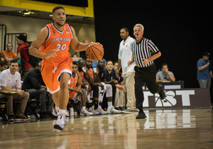 The group of Syracuse alumni kept the game within striking distance before using late run to fend off Team Fancy.