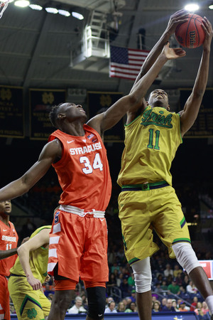 Bourama Sidibe, pictured contesting a shot, impacted SU's win over Notre Dame without scoring a point. 