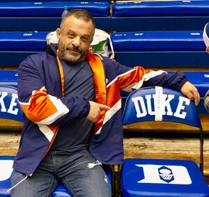 Adam Weitsman sat a row behind the Syracuse's bench at Cameron Indoor Stadium on Monday. 