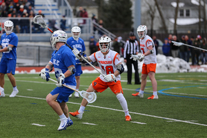 Tyson Bomberry locks in on a Duke defender last week.