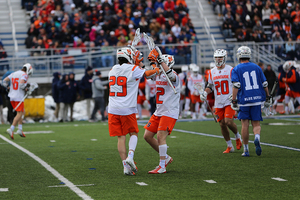 Stephen Rehfuss and Jamie Trimboli, pictured earlier this season against Duke, celebrating a score. 