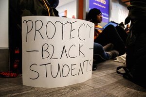 Syracuse University students gathered in the lobby of The Arch to protest against the lack of initiative following the recent Day Hall racist graffiti incident.
