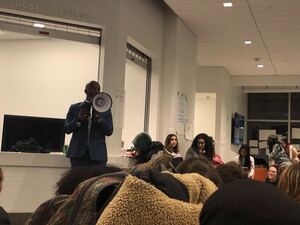 Ernest Daily, an SU assistant director for Syracuse University's Collegiate Science and Technology Entry Program has visited the sit-in everyday for hours at a time. Daily recited “The Bridge Poem” during the #NotAgainSU open-mic night. 