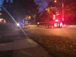 Part of the street was blocked off by SPD on Friday evening after two men were shot and killed.