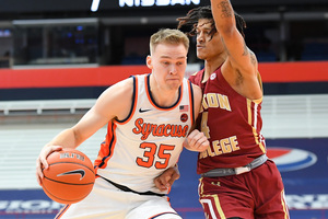 Buddy Boeheim drives to the net in Syracuse's 75-67 win over Boston College.