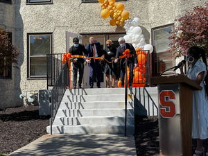 University officials and leaders gathered together to open the new building on campus.