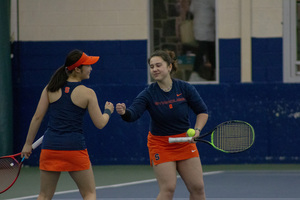 The Orange won the doubles point for the fifth time in six matches this season.