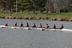 Syracuse's varsity 8 bested Cornell and Navy, finishing the race in 5:33.8.