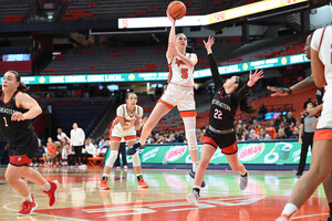 Georgia Woolley's 17 points led nine Syracuse scorers in a 79-57 win over Northeastern. The Orange have now won four straight.