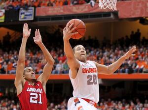 Brandon Triche goes up for a layup against Louisville on Saturday.