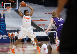 Cornelia Fondren (left)  searches down the court for an opening. 