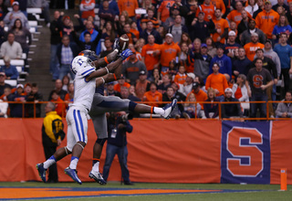 Brandon Reddish intercepts a pass with the score tied late in the game. The Orange would go three-and-out in the next possession. 