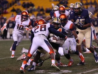 Freshman cornerback Antwan Cordy wraps up a Pitt ball-carrier. Cordy, in place of the injured Julian Whigham, recorded an interception on Saturday.