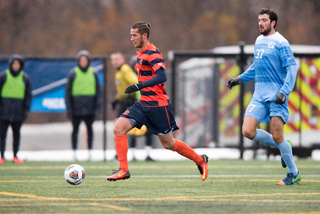 Johannes Pieles dribbles the ball forward. SU was outshot 10-6.