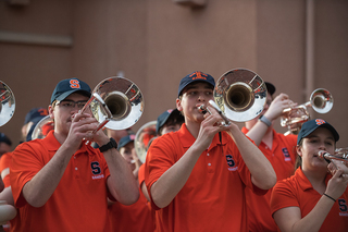 Syracuse's band arrived about 30 minutes prior to the start of the pep rally and began playing for the crowd.