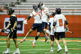 Bradley Voigt jumps after a goal. 