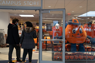 Students enter the campus store in the Schine Center.